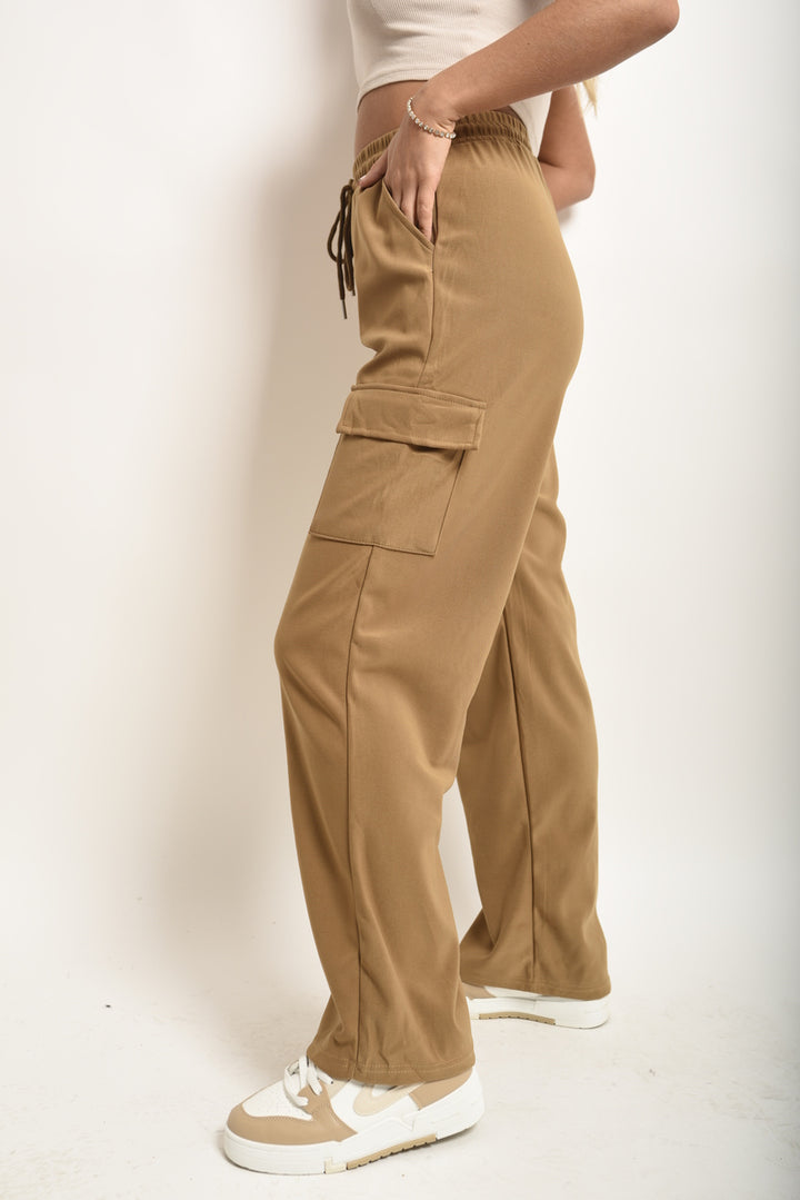 Wide Leg Drawstring Waist Flap Pocket Trouser, featuring a chic wide leg and functional flap pockets, worn by a model. Perfect for casual or semi-formal occasions.