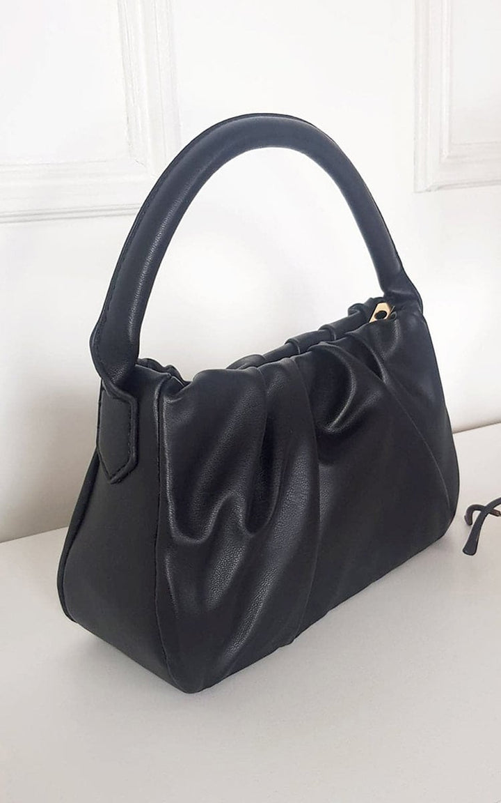 Pouch Shoulder Handbag featuring faux leather and stylish pouch detail, ideal for daily activities and versatile use.