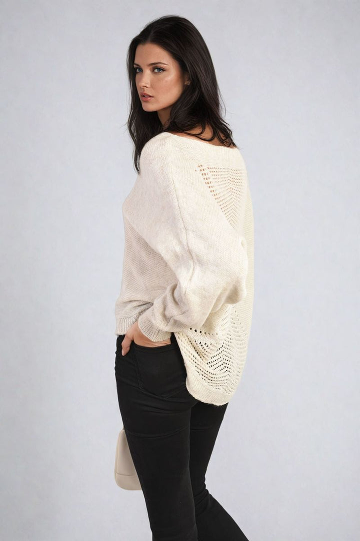 Woman wearing the Florencia Crew Neck Back Patterned Knitted Jumper, showcasing its cozy and chic design perfect for casual outings.