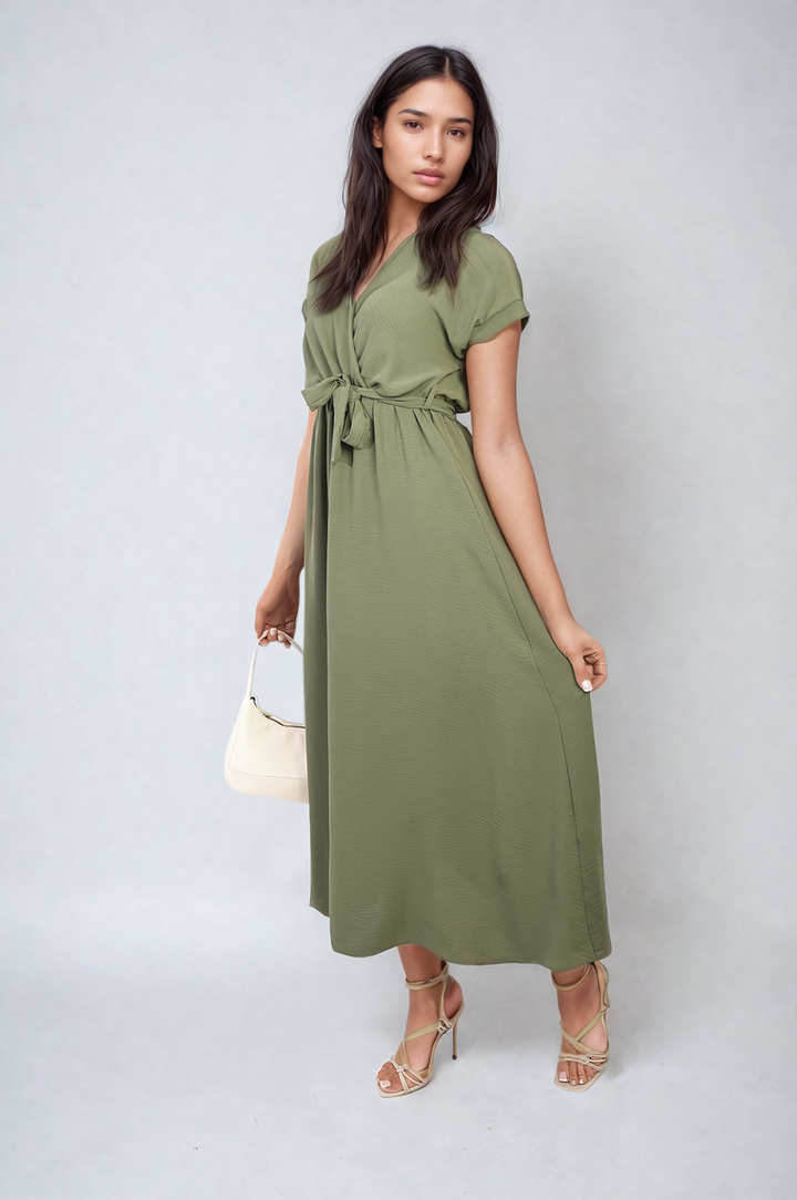 Wrap Tie Waist Short Sleeve Midi Dress on a woman, showcasing its flattering wrap design and adjustable tie waist for versatile styling.