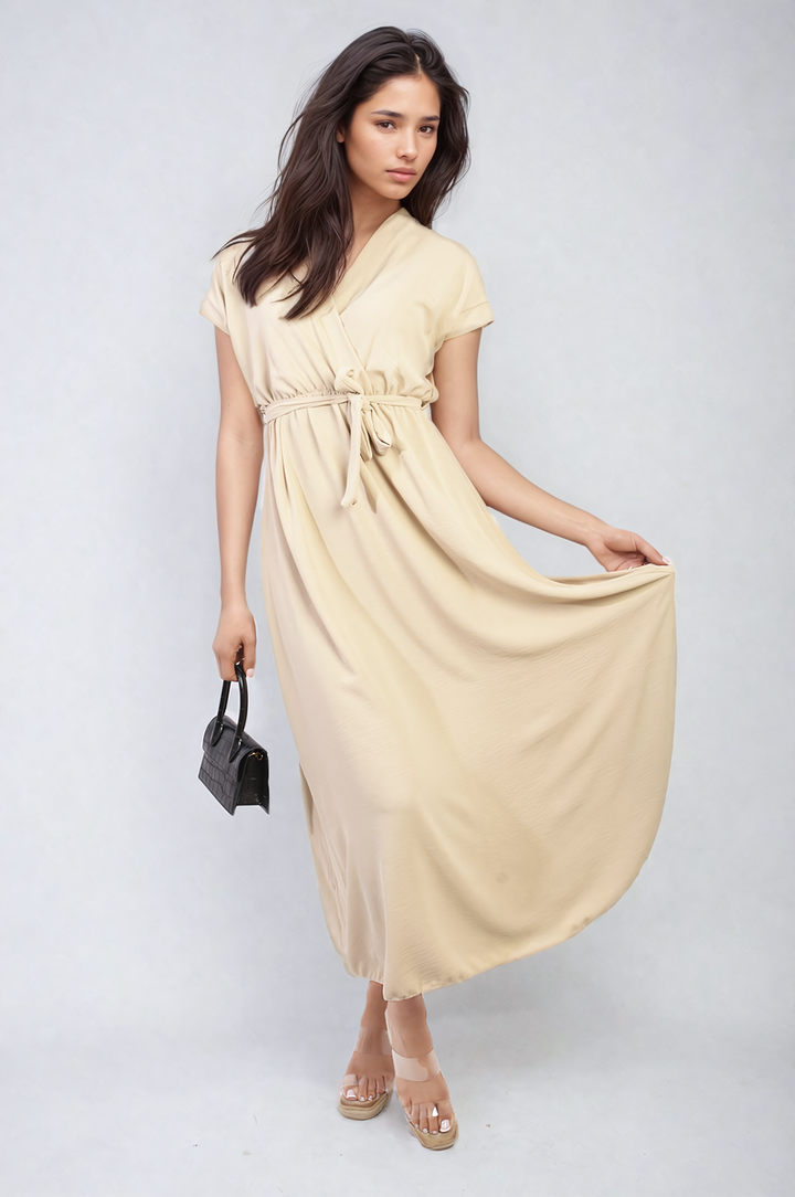 Wrap Tie Waist Short Sleeve Midi Dress modeled by a woman holding a black handbag, showcasing its elegant wrap design and adjustable tie waist.