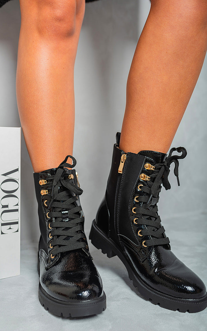 Lace Up Combat Chunky Sole Biker Ankle Boots with gold laces, showcasing a bold, edgy design and chunky sole for durability and style.