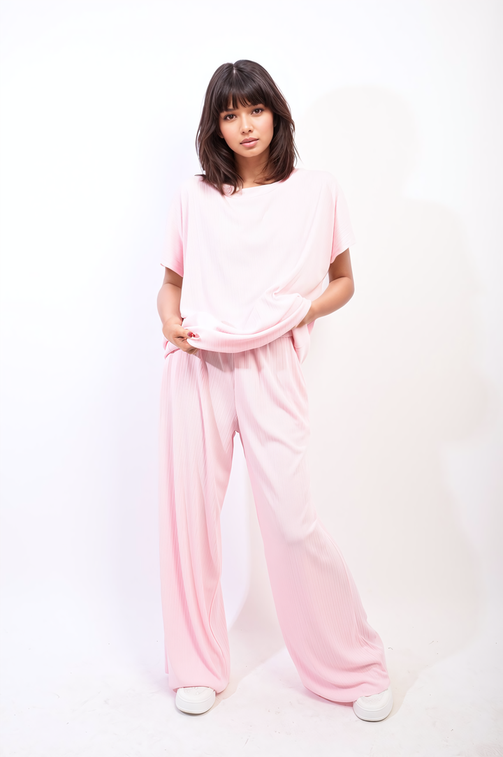 Woman wearing the Gabriella Oversized Top and Wide Leg Trouser Co-ord Set, showcasing a relaxed fit perfect for effortless style and comfort.