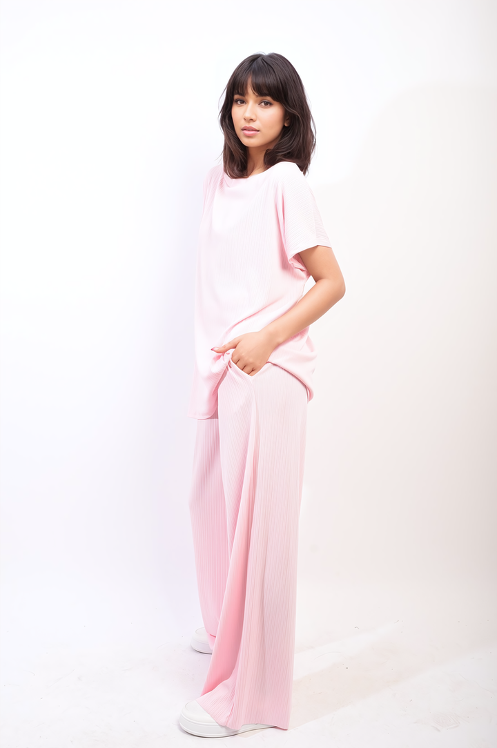 Gabriella Oversized Top and Wide Leg Trouser Co-ord Set styled on a woman, showcasing a relaxed fit and contemporary design.