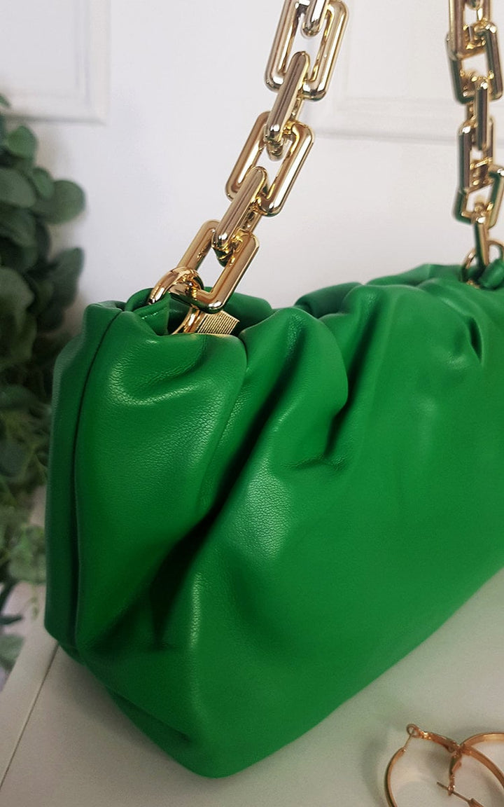 Gold Chain Slouch Handbag: Green faux leather purse with elegant gold chain detail, ideal for fashion-forward women seeking stylish, versatile accessories.