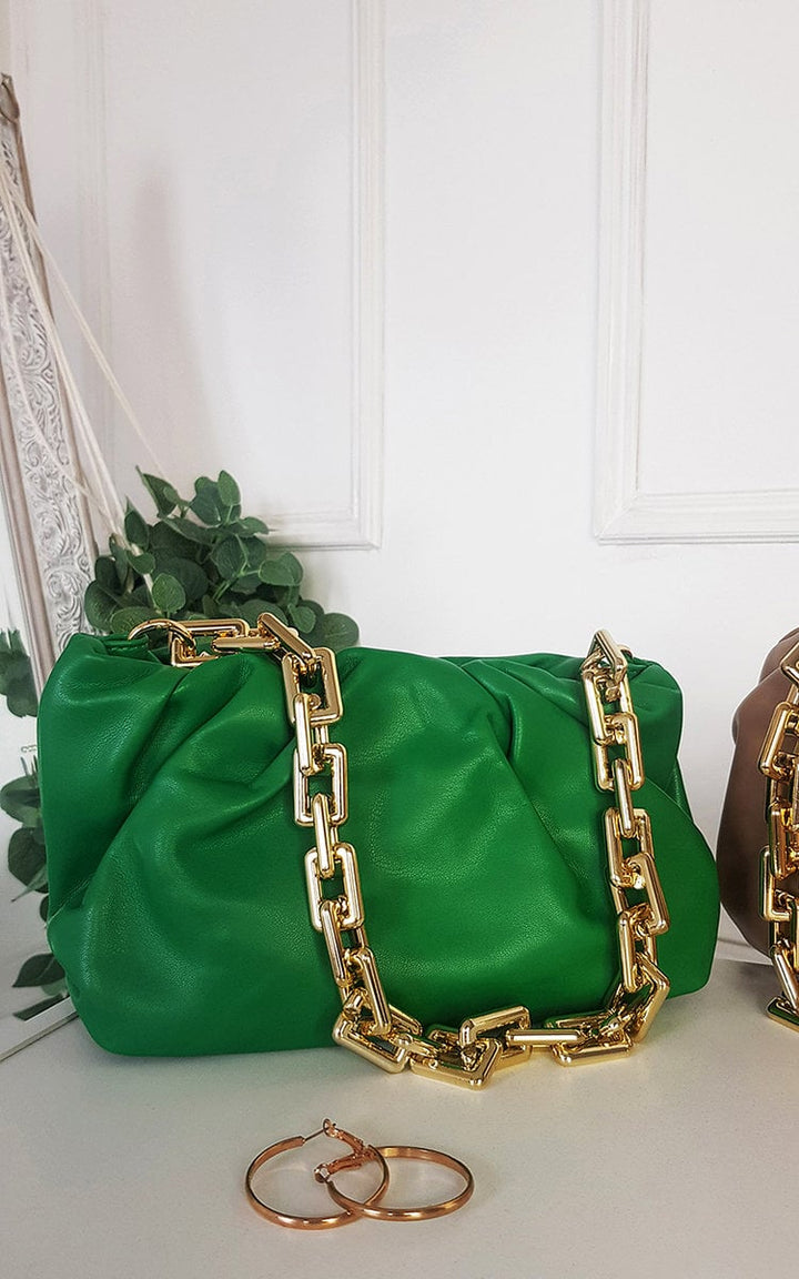 Gold Chain Slouch Handbag in green faux leather, featuring elegant gold chain details, perfect for any occasion. Ideal accessory for the stylish, on-the-go woman.