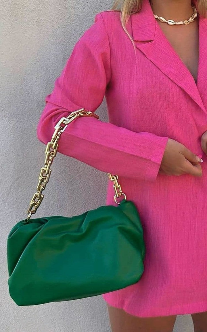 Gold Chain Slouch Handbag: A chic green faux leather handbag with gold chain detail, perfect for carrying essentials and complementing any stylish outfit.