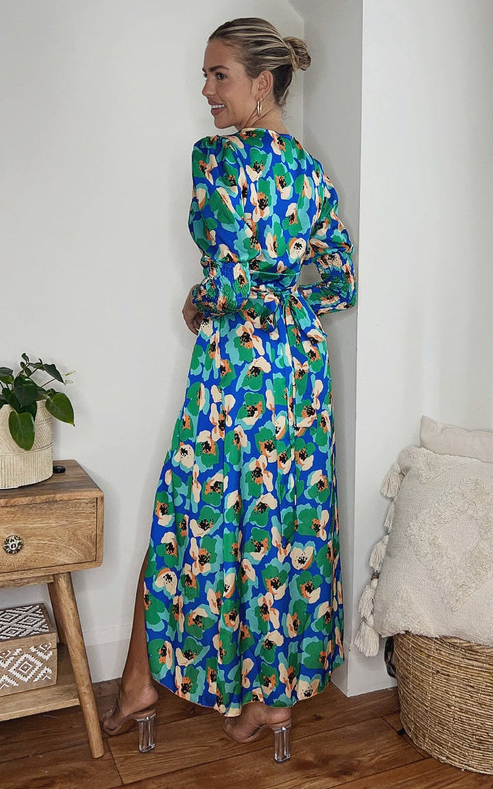 Wrap Front Printed Midi Dress on a woman, showcasing a stylish design with a flattering silhouette, ideal for special occasions or nights out.