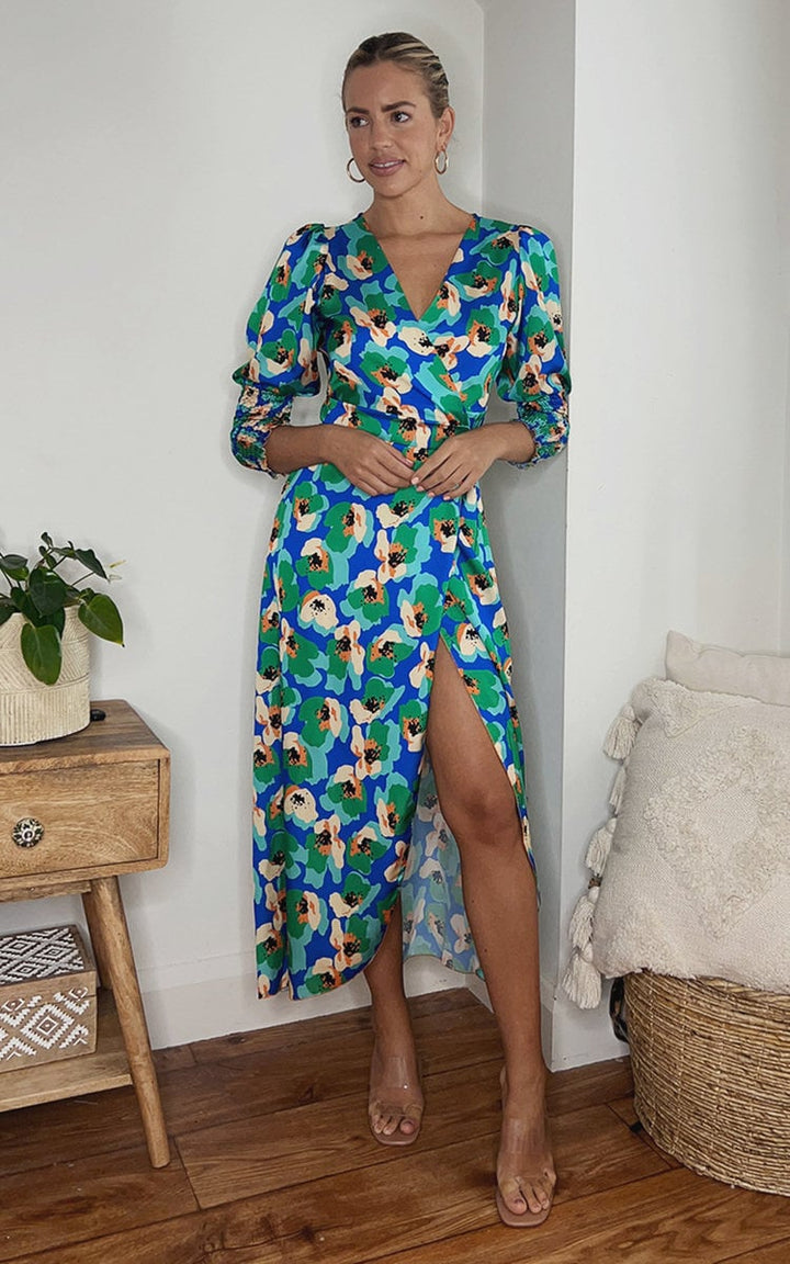 Wrap Front Printed Midi Dress worn by a woman, featuring a stylish floral pattern and flattering design, perfect for special occasions or nights out.