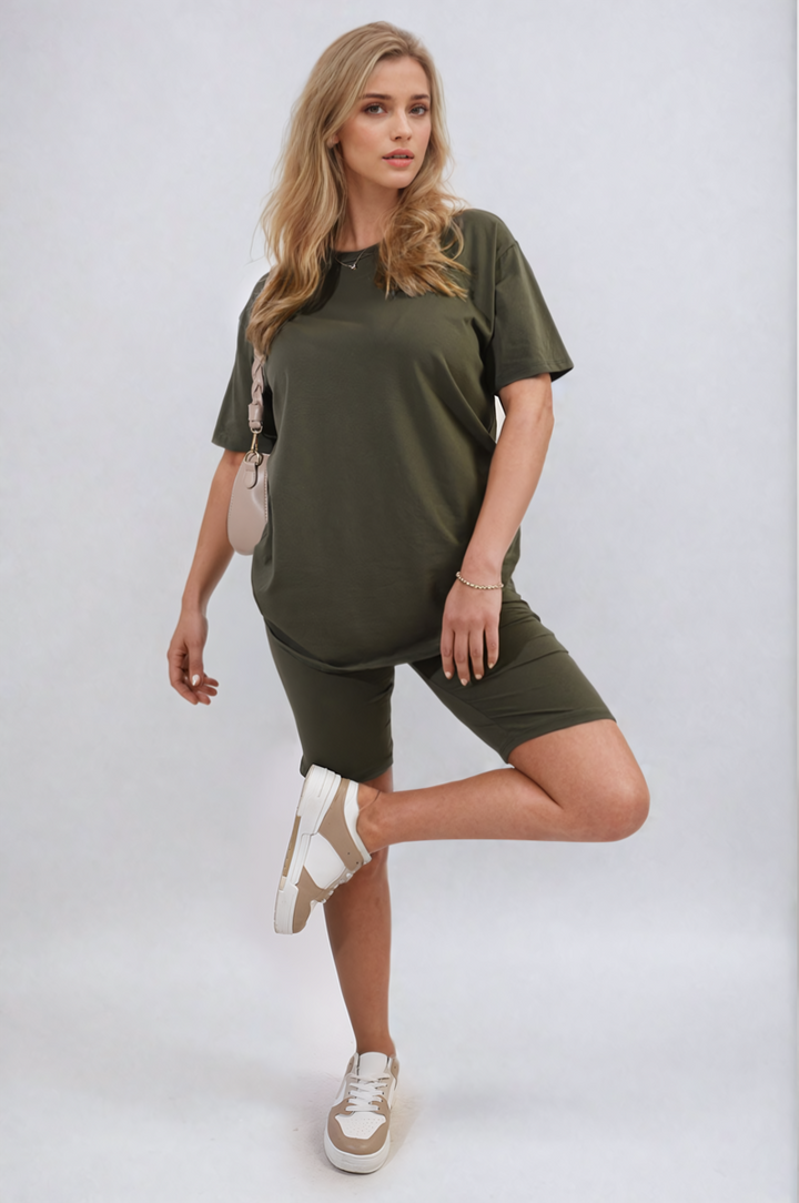 Woman modeling the Hazel Loose Fit Top and Biker Shorts Co-ord Set, showcasing a comfortable and chic casual outfit ideal for lounging or errands.