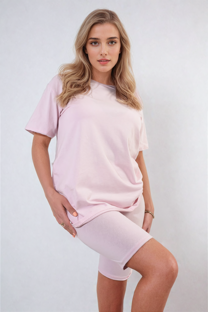 Woman in a pink Hazel Loose Fit Top and Biker Shorts Co-ord Set, showcasing casual comfort and style for everyday wear.