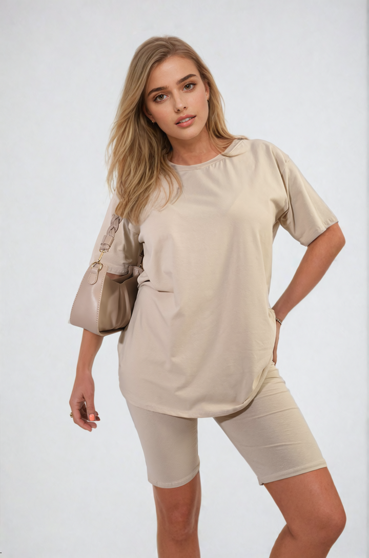 Woman in Hazel Loose Fit Top and Biker Shorts Co-ord Set, showcasing a stylish, casual outfit perfect for lounging or everyday wear.