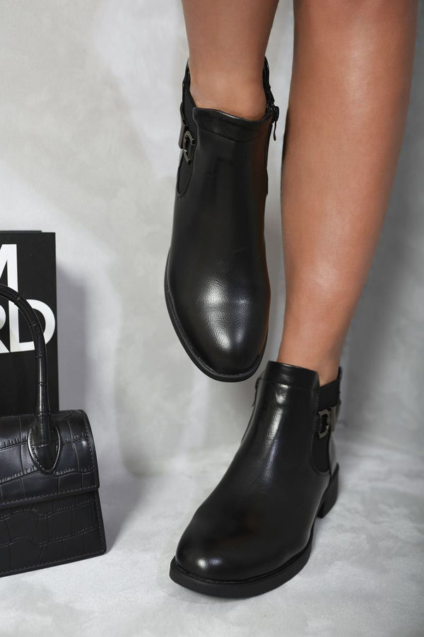 Low Block Heel Buckle Ankle Boots showcased with sleek buckle detail, emphasizing style and comfort for everyday wear.