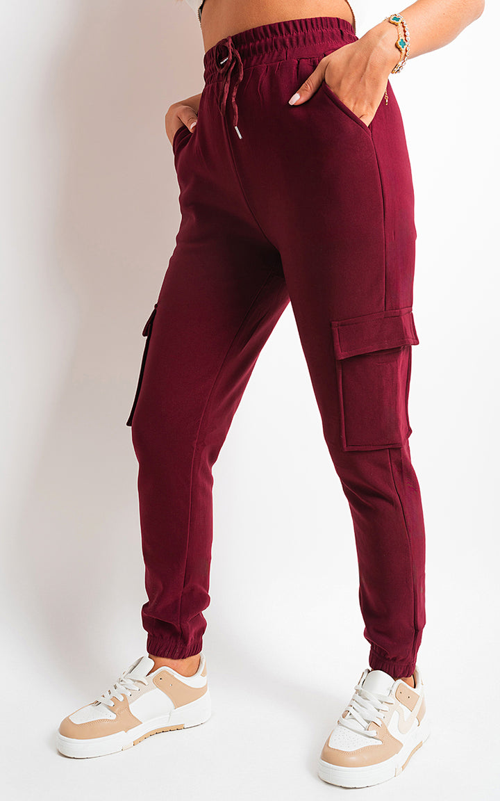 Fleece Lined Cargo Pocket Trouser with Drawstring, featuring utilitarian pockets and drawstring waist, ideal for stylish and practical adventures. Perfect for holiday and everyday wear.