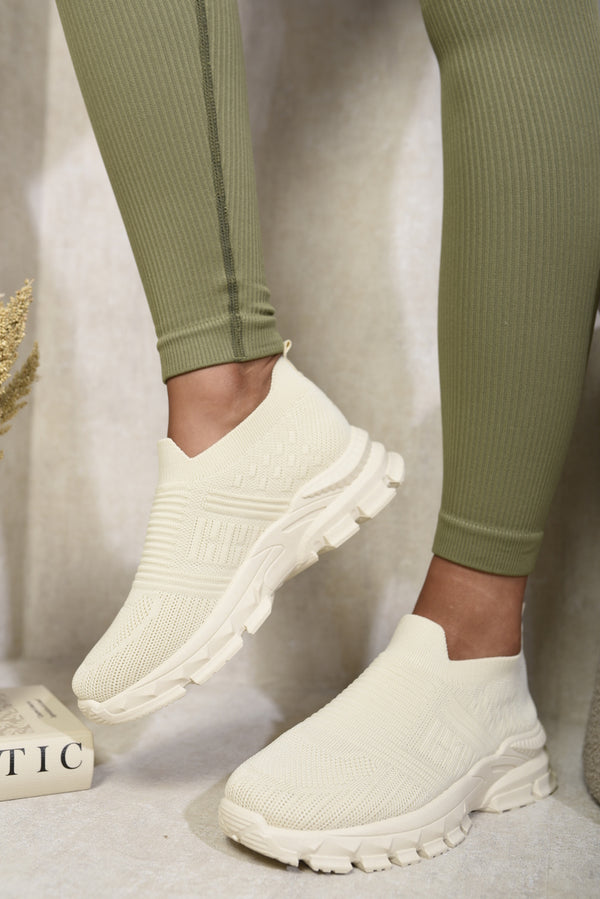 Knit Detail Slip On Chunky Trainers worn by a person, showcasing their stylish design and comfort, perfect for casual and versatile fashion.