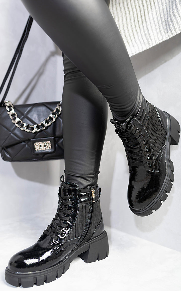 Lace Up Chunky Ankle Boots showcase a stylish, comfortable design with a chunky heel and customizable lace-up fit, perfect for versatile fashion statements.