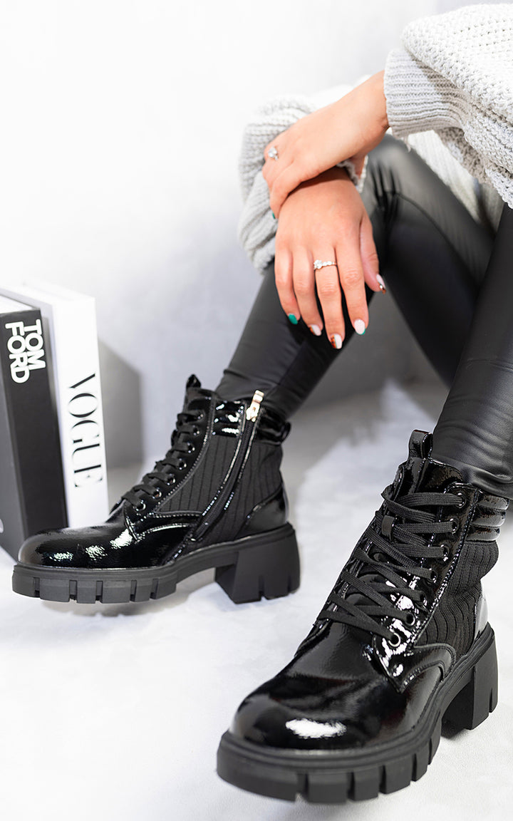 Lace Up Chunky Ankle Boots showcasing a sleek, lace-up design with a chunky heel, perfect for versatile styling and everyday comfort.