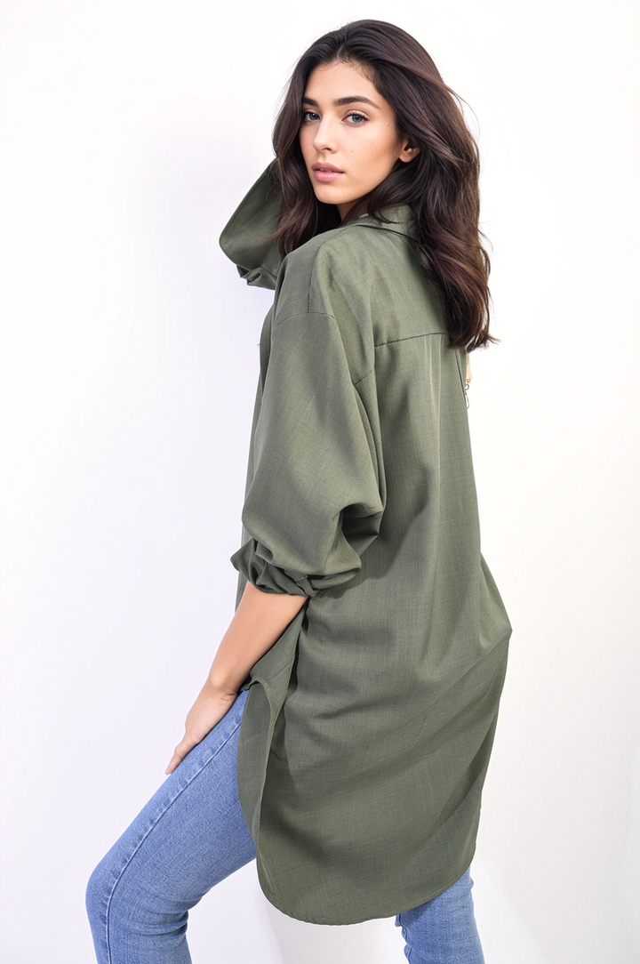 Woman modeling the Button Up Oversized Long Back Shirt Dress, showcasing its relaxed fit and distinctive long back hemline.