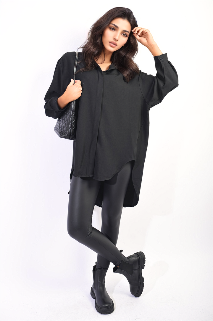 Woman in Button Up Oversized Long Back Shirt Dress, holding a purse and showcasing fashion-forward design, perfect for versatile styling and everyday elegance.