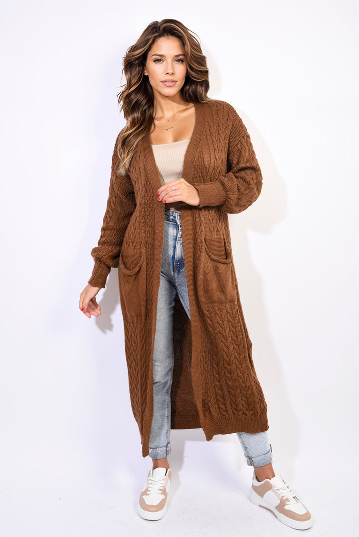 Front Open Long Knitted Cardigan with Front Pockets worn by a woman, featuring a cozy design perfect for stylish everyday wear.