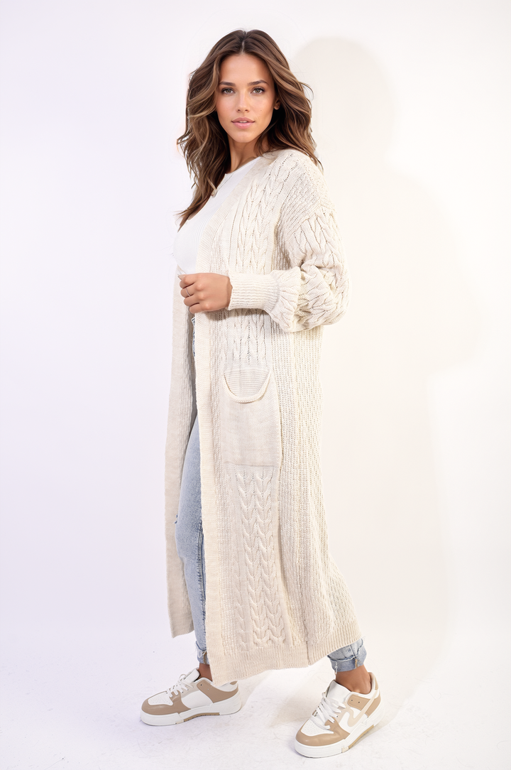 Woman wearing the Front Open Long Knitted Cardigan with Front Pockets, showcasing its cozy, stylish design and practical features.