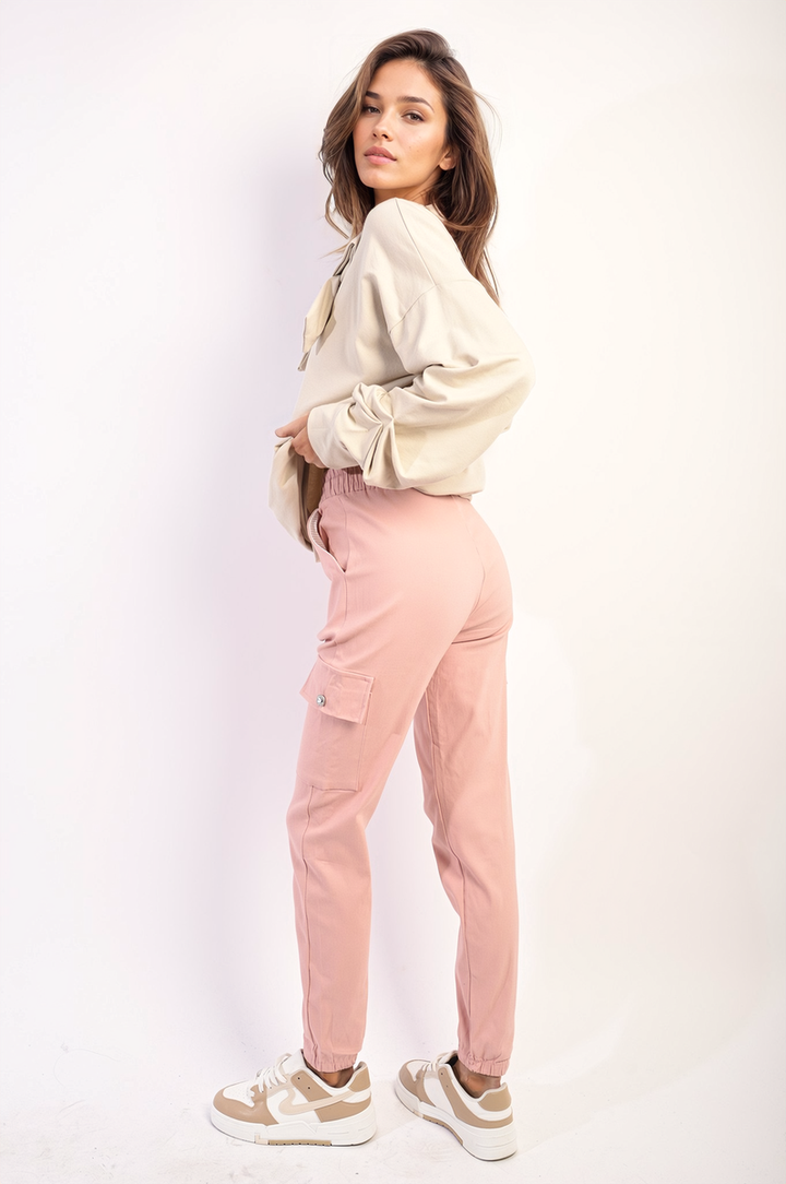 Woman wearing Janelle Drawstring Waist Cargo Joggers, showcasing their stylish design with drawstring waist and cargo pockets, perfect for versatile, everyday wear.