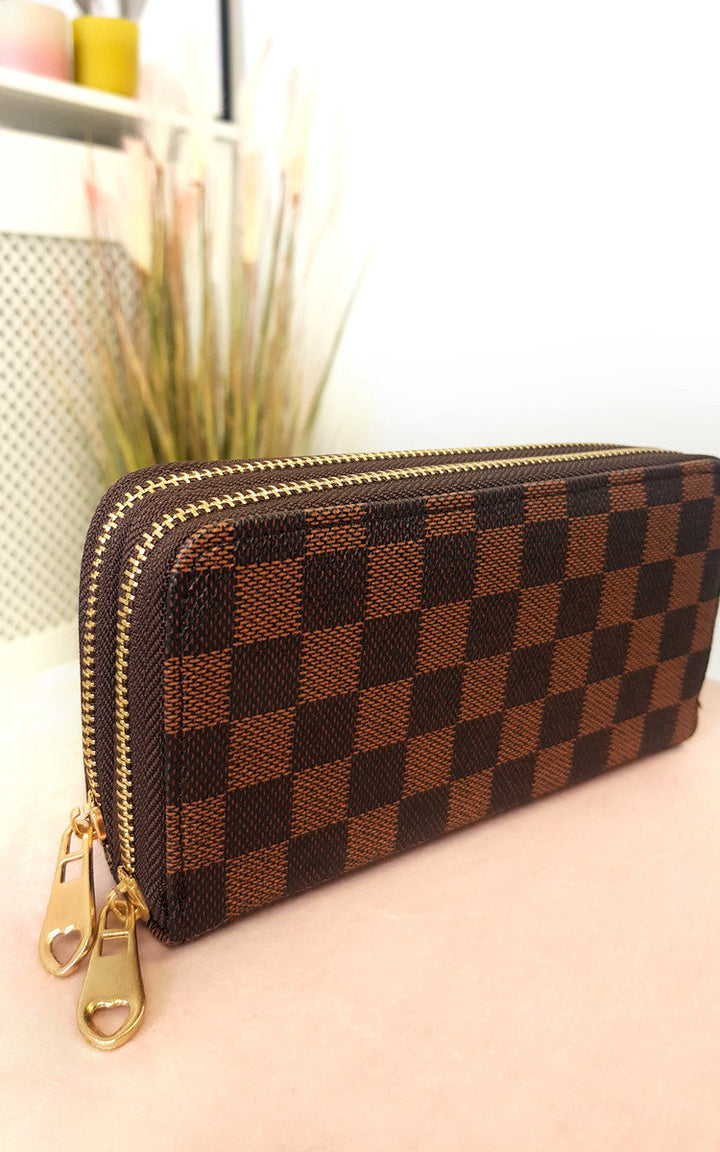 Check Double Style Zip Purse with a brown and black checkered pattern, featuring double zippers with a heart cutout and inside pockets, perfect for fashion accessories.