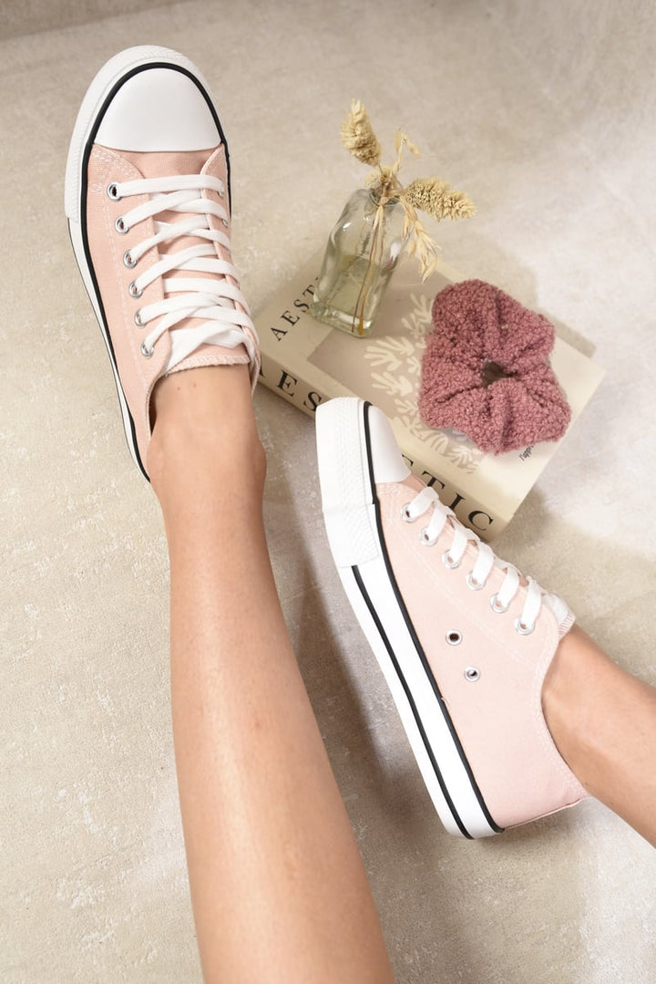 Jenna Platform Low Top Lace Up Trainers showcasing stylish design with pink sneakers, emphasizing comfort and chic style for everyday wear.