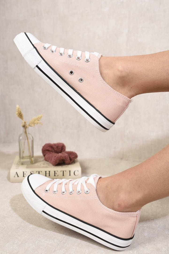 Platform Low Top Lace Up Trainers showcase chic style with a comfortable fit, perfect for casual outfits, featuring a platform sole and durable design for everyday wear.