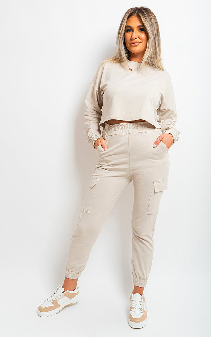 Woman in Jessie Cropped Long Sleeve Top and Cargo Joggers, showcasing trendy co-ordinate set with stylish footwear, ideal for street-style fashion.