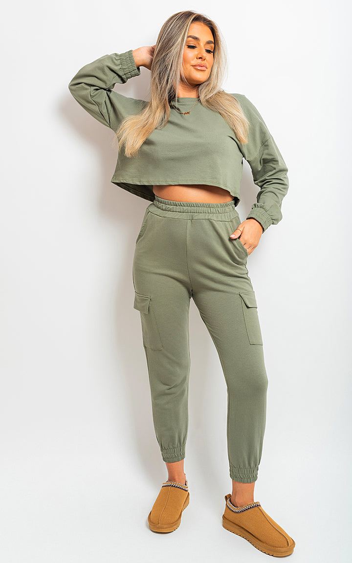 Woman in green Cropped Long Sleeve Top and Cargo Joggers Co-ordinates, posing, showcasing stylish comfort for a casual, fashion-forward look.