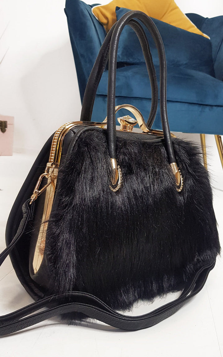 Faux Fur Handbag with gold trim and diamante clip, showcasing a blend of faux fur and leather materials, ideal for stylish everyday use.