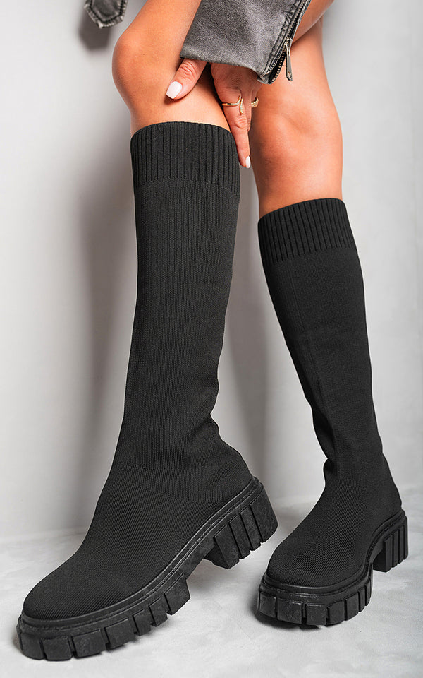 Knee High Chunky Sock Boots featuring a snug sock-like fit, chunky heel, and non-slip sole, perfect for stylish and comfortable wear.