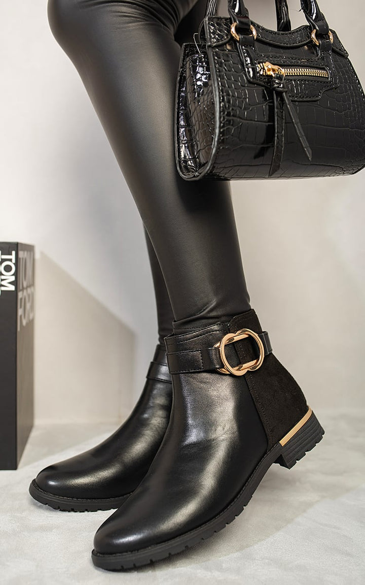 Buckle Belt Chelsea Ankle Boots with stylish buckle details, showcasing a modern twist on a classic design for versatile, confident wear.