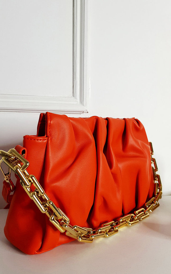 Faux Leather Shoulder Bag with Chain Strap, featuring a red scrunched texture and chunky gold chain, perfect for a fashionable night out.