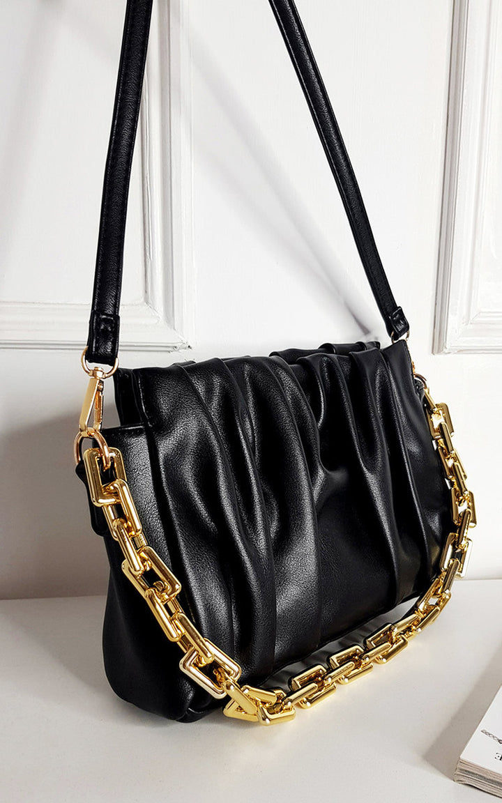 Faux Leather Shoulder Bag with Chain Strap featuring scrunched texture and gold chain, ideal for stylish outings, aligning with Holiday-clothes.co.uk's fashionable offerings.