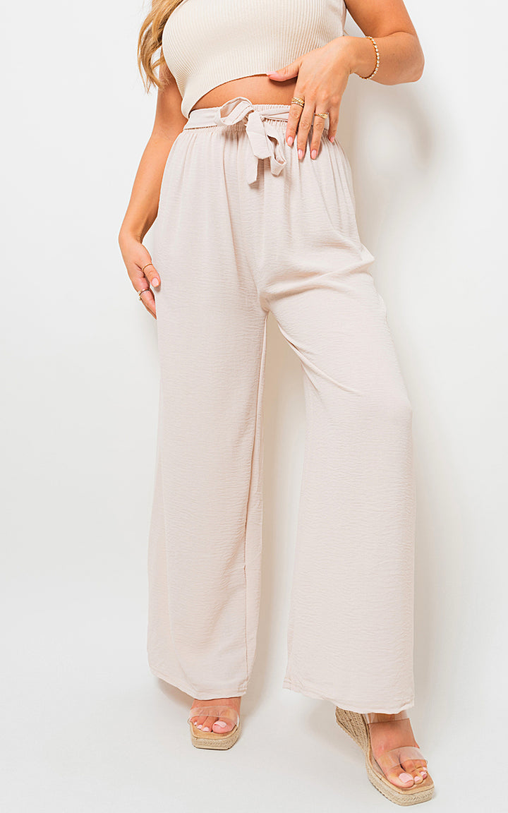 Drawstring Waist Wide Leg Trouser with customizable fit and elegant silhouette, worn by a model showcasing its chic and comfortable design.