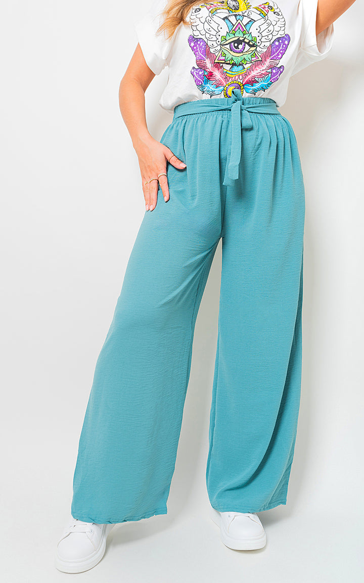 Drawstring Waist Wide Leg Trouser worn, showcasing relaxed fit and stylish design, perfect for casual or dressy occasions. Ideal for enhancing your wardrobe with chic comfort.