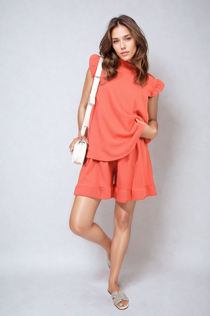 Ruffle Trim Sleeve Top and Shorts Co-ord Set featuring ruffle sleeves and high-waisted shorts, ideal for a chic, playful summer look.