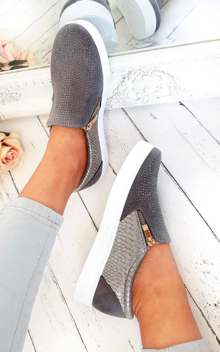 Slip On Embellished Trainers on feet, featuring diamante embellishments on faux suede and croc-style faux leather, ideal for pairing with skinnies and a blazer.