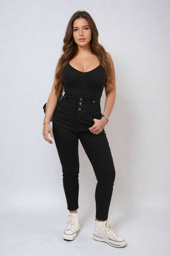 High Waist Button Skinny Jeans paired with white sneakers, showcasing a flattering fit and modern flair, ideal for casual and dressier occasions.