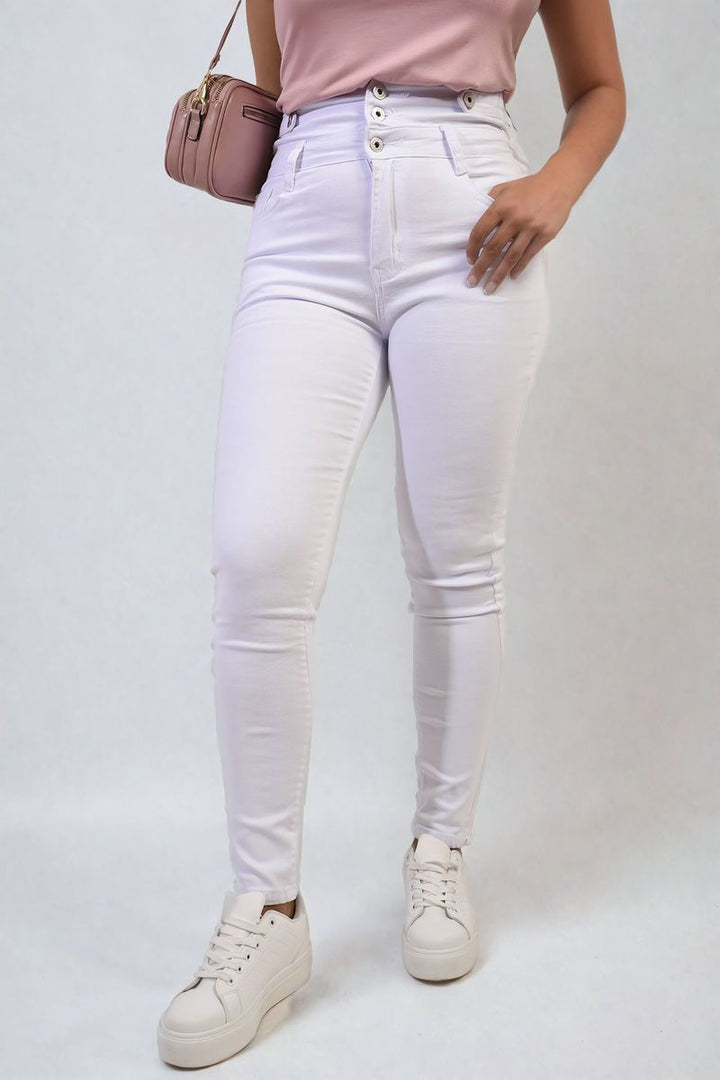 Person wearing High Waist Button Skinny Jeans, featuring a high waist and button-up front, highlighting a sleek fit. Perfect for casual or dressier occasions.