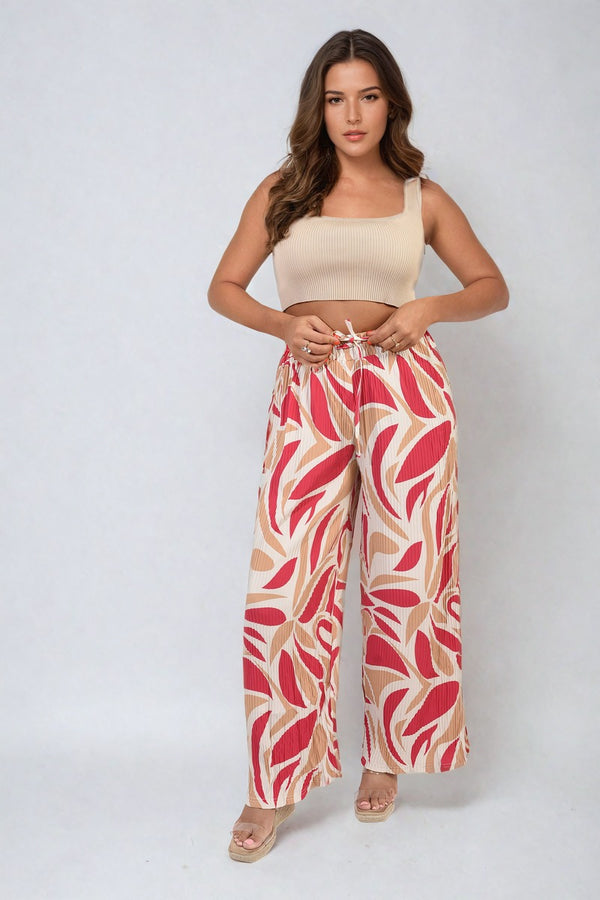 Abstract Pattern Wide Leg Trousers worn by a woman, showcasing a chic design ideal for stylish, comfortable holiday or everyday wear.