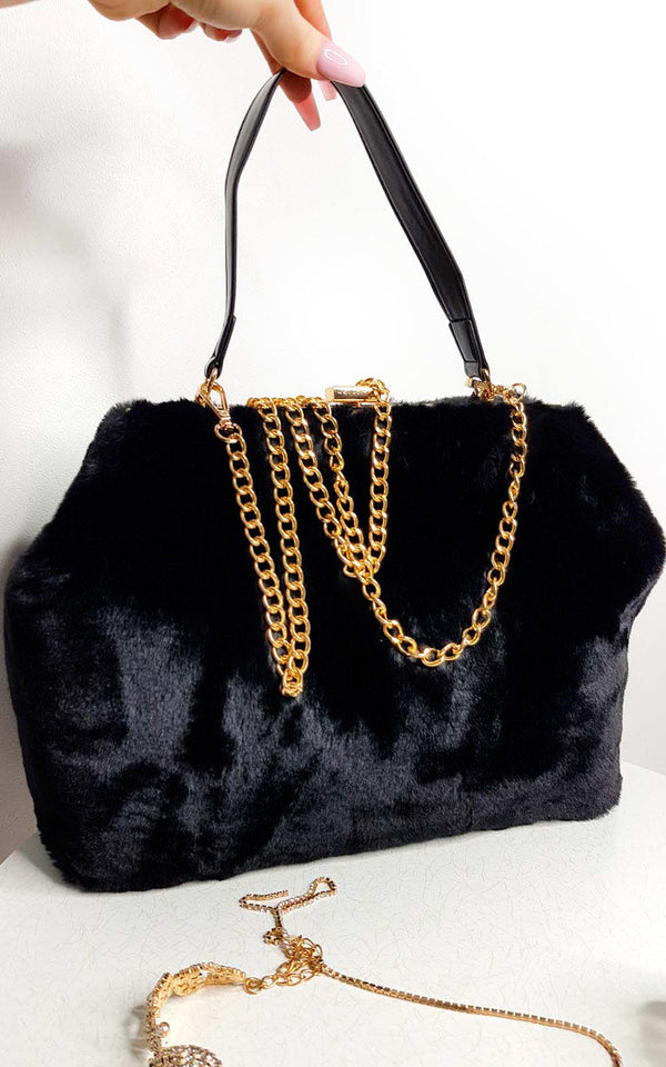 Fluffy HandBag with gold chain strap, featuring faux fur and clasp closure, ideal for chic styling from Holiday Clothes UK.