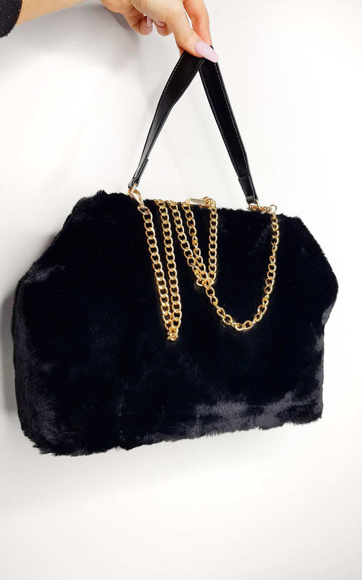 Fluffy HandBag featuring faux fur with gold chain straps and clasp closure, perfect for stylish looks from Holiday Clothes UK.