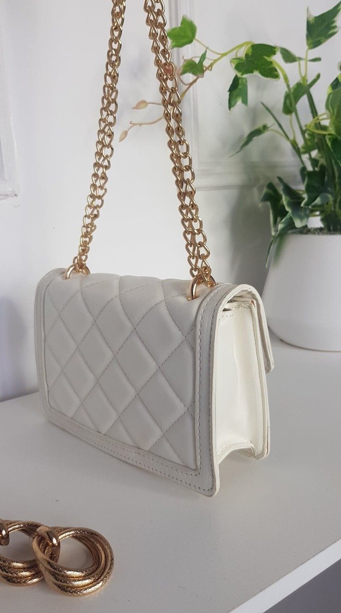 Quilted Chain Detail Handbag with gold chain accents, perfect for stylish occasions, featuring a chic design ideal for complementing any outfit.