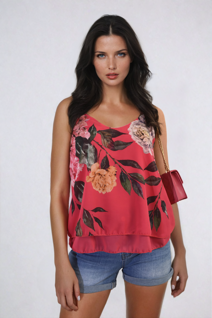 Floral Print Layered Cami Top showcasing a stylish floral design, perfect for casual outings. Modeled by a woman, highlighting its comfortable and trendy fit.