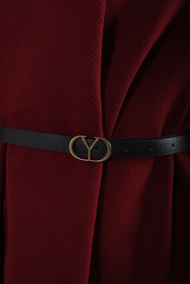 Close-up of the High Neck Belted Cape Jacket, highlighting the elegant belt detail, perfect for adding a polished touch to any outfit.