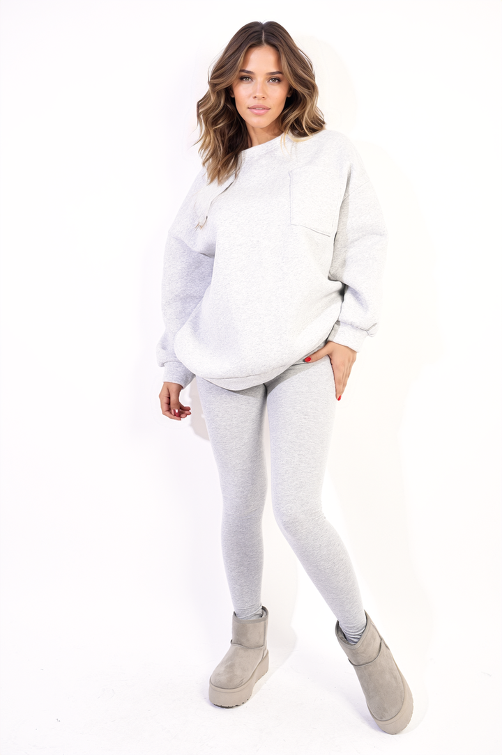 Oversized Pocket Sweatshirt and Leggings Co-ord Set, featuring a cozy oversized sweatshirt with side pockets and high-waisted leggings, ideal for comfort and style.