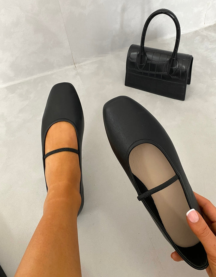 Round Toe Ballet Slip-On Flat Sandals paired with a black handbag, highlighting elegant everyday footwear from Holiday-clothes.co.uk.